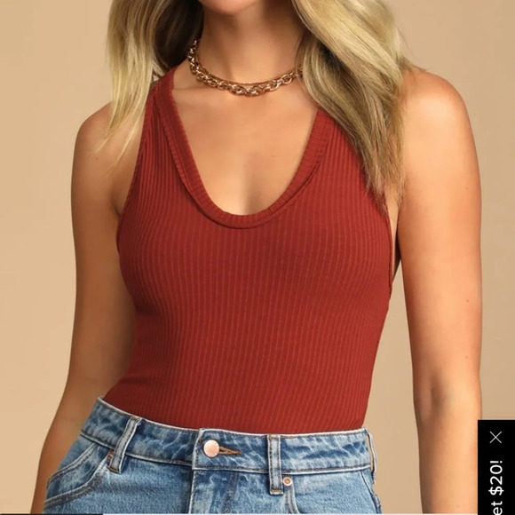 Free People Tops - Free People speed dial body suit in rust / orange. NWOT. Size XS.